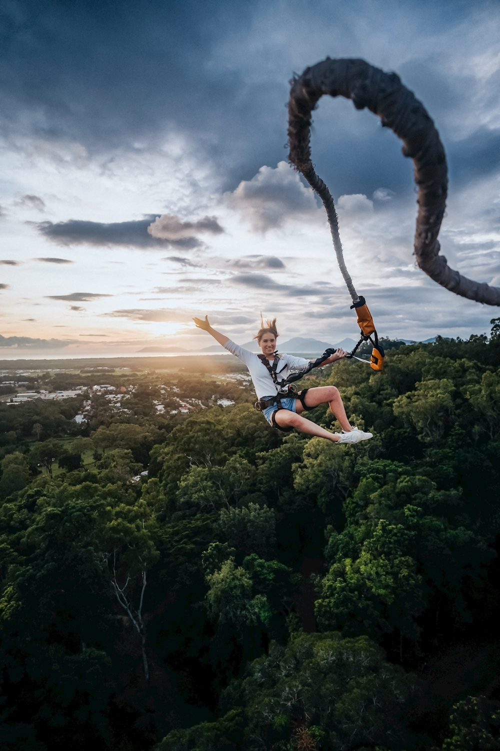 Bungy jumping from height in tropical setting